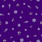 Delphinium small flowers seamless pattern design on purple background