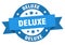 deluxe round ribbon isolated label. deluxe sign.
