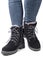 demi-season women`s boots black on the feet in jeans