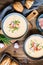 Demikat, classic Slovakian creamy sheep cheese soup topped with roasted bacon and fresh chives