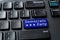 Democratic Party blue key on a decktop pc keyboard. United States elections and politics concepts. Voting online for Democratic