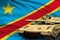 Democratic Republic of Congo modern tank with not real design on the flag background - tank army forces concept, military 3D