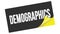 DEMOGRAPHICS text on black yellow sticker stamp
