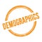DEMOGRAPHICS text written on orange grungy round stamp