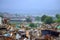 Demolished shacks ruins in rainy day