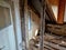 demolition of the attic of an old house. partitions made of boards and