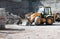 Demolition bulldozer at urban renewal construction site