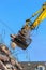 Demolition crane dismantling a building