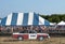 Demolition derby car and crowd