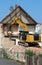 Demolition of a house with a chain excavator