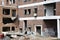 Demolition work on the brick house in the center of the town