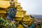 The demon statue supporting golden pagoda at Wat Phra Kaew (Temple of the Emerald Buddha)