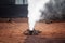 Demonstration of the volcanic water geyser in Timanfaya National Park