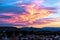 Denia Spain evening sunset with amazing bright colourful clouds over the mountains