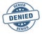 denied stamp. denied round grunge sign.