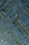 Denim abstract stitched background with pocket, blue jeans fabric texture with seams, youth concept