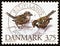 DENMARK - CIRCA 1994: A stamp printed in Denmark shows House Sparrows Passer domesticus, circa 1994.