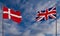 Denmark and Great Britain flags. Blue sky flag Denmark and flag Great Britain. 3D work and 3D image