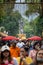 Denpasar,Bali, Dec 24 2022: The throng at the 15th Denpasar Festival with the backdrop of the iconic Catur Muka statue. Following