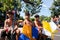 DENPASAR/BALI-JUNE 15 2019: Balinese children, wearing traditional Balinese clothes, prepare to play traditional kites at the Bali