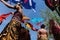 DENPASAR/BALI-JUNE 15 2019: Balinese children, wearing traditional Balinese clothes, prepare to play traditional kites at the Bali