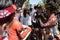 DENPASAR/BALI-JUNE 15 2019: Papuan dancers are chatting with foreign tourists from Europe before the show at the opening of the