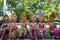 DENPASAR/BALI-JUNE 15 2019: Young Balinese women wearing traditional Balinese headdress and traditional sarong at the opening