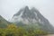 Dense clouds creeping over the hills bordering the Li River