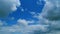 Dense Cumulus Clouds On A Clear Blue Sky. White Clouds In Blue Sky. Picturesque View Of Blue Sky With Fluffy Clouds