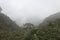 Dense fog over bogota andean rain forest at eastern city mountains