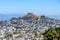 Dense houses near the hill in the middle against the bay view in San Francisco, California