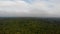 Dense and humid Amazon forest. The clouds are in the trees. View from above