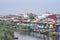 Densely built colorful houses by a port captured in Bandar Anzli, Iran