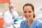 Dental assistant smiling woman friendly nurse