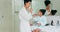 Dental, bathroom and mother and child brushing teeth for oral health, teeth healthcare and cleaning mouth with