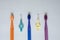 Dental care concept. Flat lay. Blue and purple toothbrushes, interdental brushes on a blue background