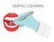 Dental cleaning of teeth. A gloved hand holds a dental polishing drill. Cosmetic and aesthetic dentistry. Professional appointment