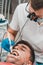 Dental clinic, private practice, the dentist uses binoculars for the best result and work, the process of removing tartar