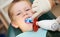 Dental filing of child tooth by