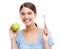 Dental, health and apple with woman and toothbrush for nutrition, medical and cleaning. Fruit, diet and wellness with