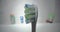 Dental hygiene essentials: macro view of electric toothbrush in bathroom
