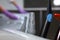 Dental instruments close-up against the background of room disinfection. Out of focus. Unrecognizable photo. Copy of the