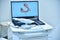 Dental intraoral 3d scanner and laptop on table