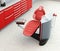 Dental office interior with metallic red unit equipment and cabinet