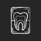 Dental x-ray chalk white icon on black background