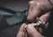 A dental technician makes a prosthetic teeth. laboratory. close-up.