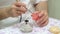 Dental technician making removable dentures. Prosthetic dentistry. Close up