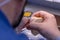 Dental technician working with dental prosthetics - close up view