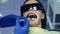 Dentist is applying blue acid on woman's teeth before installing veneers.