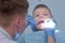 Dentist chekup child boy teeth on preventive examination in dentistry clinic.